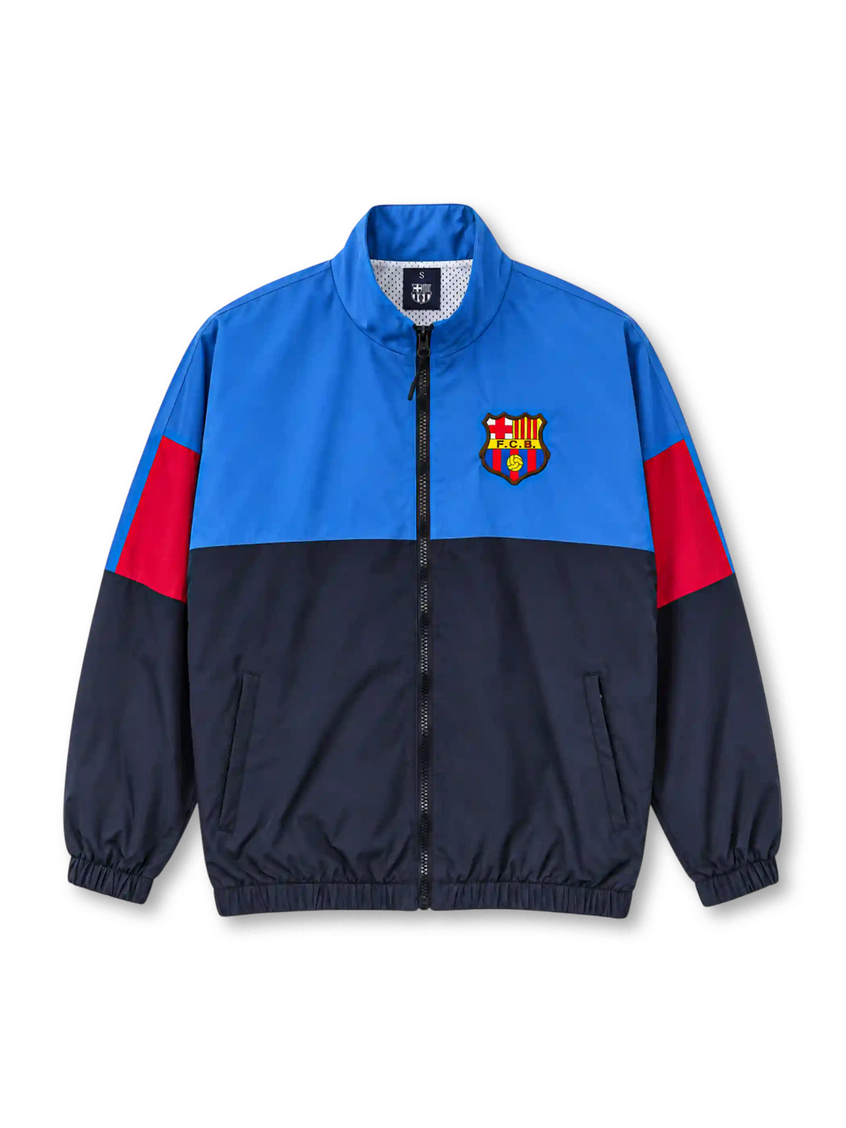 Front view of the FC Barcelona 1899 vintage track jacket featuring an electric blue upper body, navy lower panels, red sleeve accents, embroidered-style Barcelona crest, high stand-up collar, black front zipper, side pockets, and elasticated cuffs.