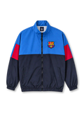 Front view of the FC Barcelona 1899 vintage track jacket featuring an electric blue upper body, navy lower panels, red sleeve accents, embroidered-style Barcelona crest, high stand-up collar, black front zipper, side pockets, and elasticated cuffs.
