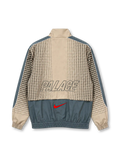 Front view of the England 2026 Nike x Palace track jacket in light grey and slate grey, featuring an all-over cross pattern, co-branded Nike Palace chest emblem, Three Lions crest, white piping, full zipper, front pockets, and elasticated cuffs.