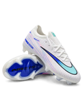 Nike Mercurial Vapor 15 Elite FG soccer cleats in white with pink and blue streak graphics, a blue-to-teal gradient Swoosh, blue Air Zoom heel lettering, and a blue Air Zoom soleplate, shown from the lateral side and outsole.