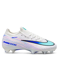 Nike Mercurial Vapor 15 Elite FG soccer cleats in white with pink and blue streak graphics, a blue-to-teal gradient Swoosh, blue Air Zoom heel lettering, and a blue Air Zoom soleplate, shown from the lateral side and outsole.