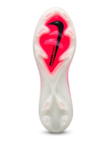 Nike Mercurial FG soccer cleats in white and pink with fine pink streak graphics, a black-outlined Swoosh fading to coral pink, pink Air Zoom heel lettering, and an oversized M heel logo, shown as a pair.