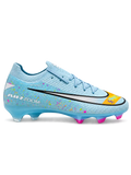 Nike Mercurial FG soccer cleats in light blue with multicolor confetti speckles, a black-outlined silver Swoosh, an orange painted toe graphic, an oversized M heel logo, and pink-tipped studs, shown as a pair.
