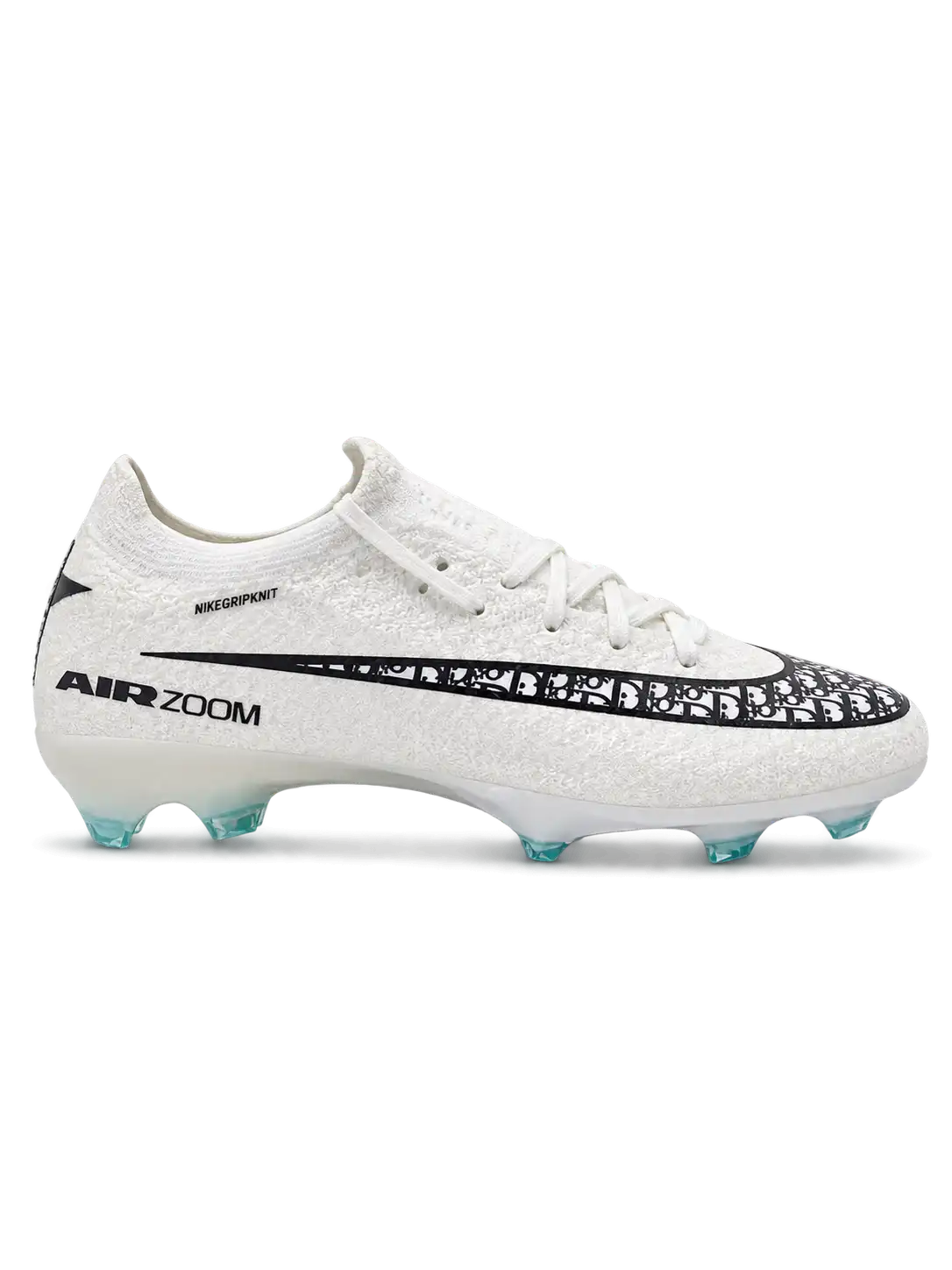 White Nike Mercurial-style FG soccer cleats with black patterned Swoosh, AIR ZOOM graphics, and translucent mint-colored studs, shown from the side and outsole.