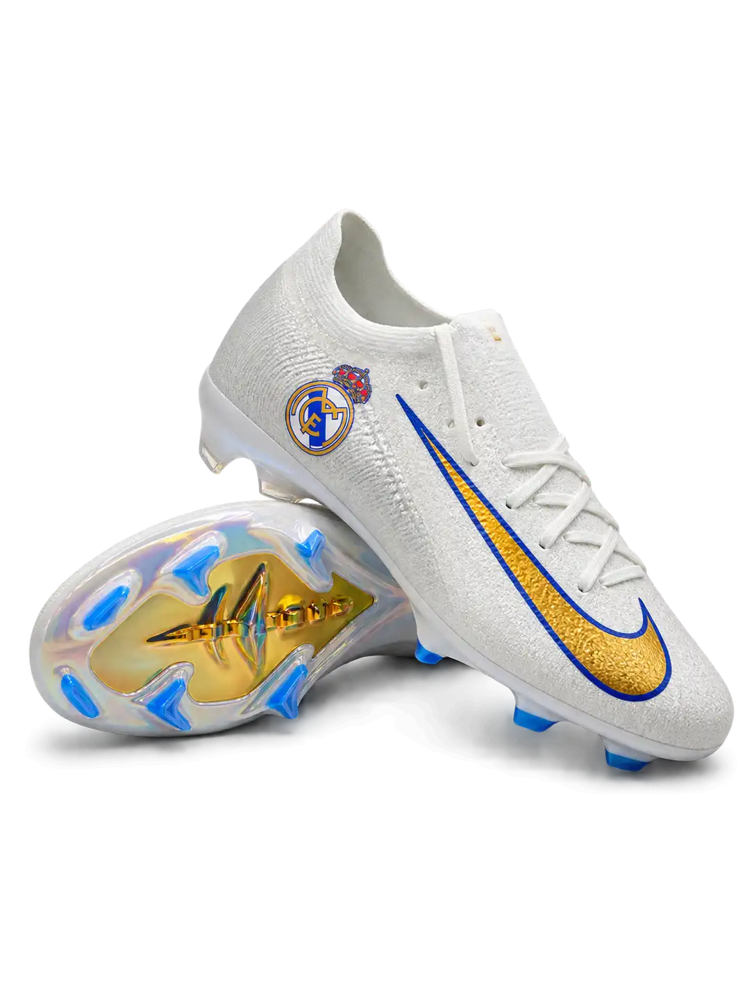 White Nike Mercurial-style FG soccer cleats with a Real Madrid crest, metallic gold Swoosh outlined in blue, and iridescent outsole with blue studs.