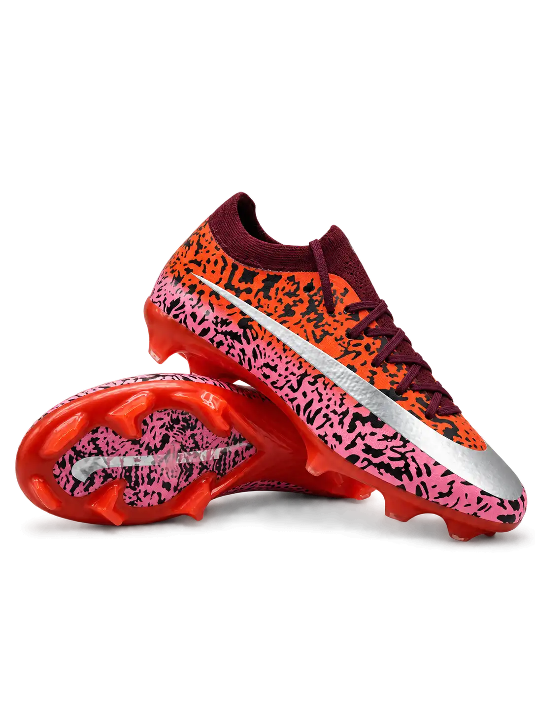Nike Mercurial-style FG soccer cleats with orange and pink Safari-inspired black graphics, metallic silver Swoosh, burgundy laces, and glossy red studded outsole.