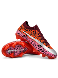 Nike Mercurial-style FG soccer cleats with orange and pink Safari-inspired black graphics, metallic silver Swoosh, burgundy laces, and glossy red studded outsole.