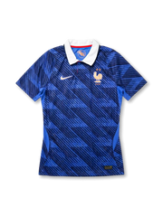 France national team Nike 2026 World Cup Authentic (Player Issue) home jersey in royal blue with diagonal navy camo print, white polo collar with red inner lining, white Swoosh at left chest, two-star gold Gallic cockerel crest at right chest