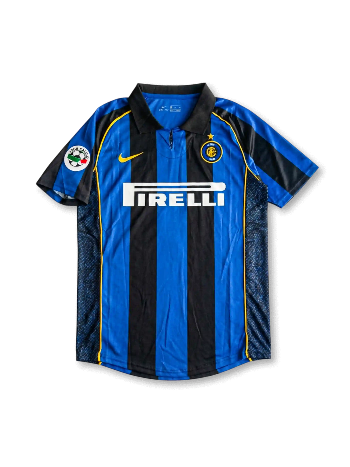 Front view of Inter home shirt in black and blue stripes with Pirelli sponsor, yellow swoosh, club crest, fold-over collar, and league sleeve patch.