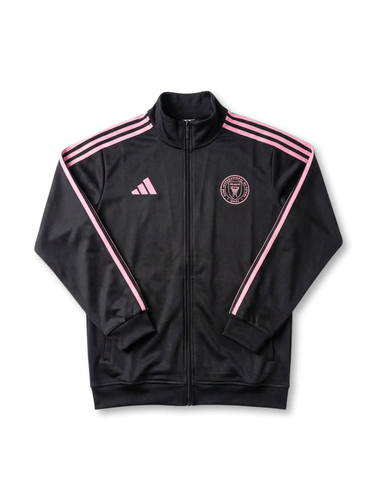 Inter Miami CF adidas track jacket in black with pink Three Stripes on sleeves, pink adidas logo at left chest, tonal pink circular Inter Miami CF crest at right chest, ribbed collar and cuffs, twin zip pockets