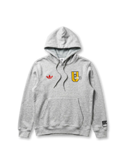 Manchester United adidas Originals grey marl collegiate hoodie with red Trefoil at left chest, yellow MAN UNITED shield badge at right chest, and co-branded woven label at sleeve