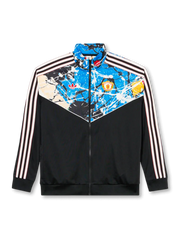 Manchester United × adidas Originals × The Stone Roses black track jacket with paint-splatter chevron yoke panel, red devil crest and Trefoil within the artwork, off-white Three Stripes on sleeves