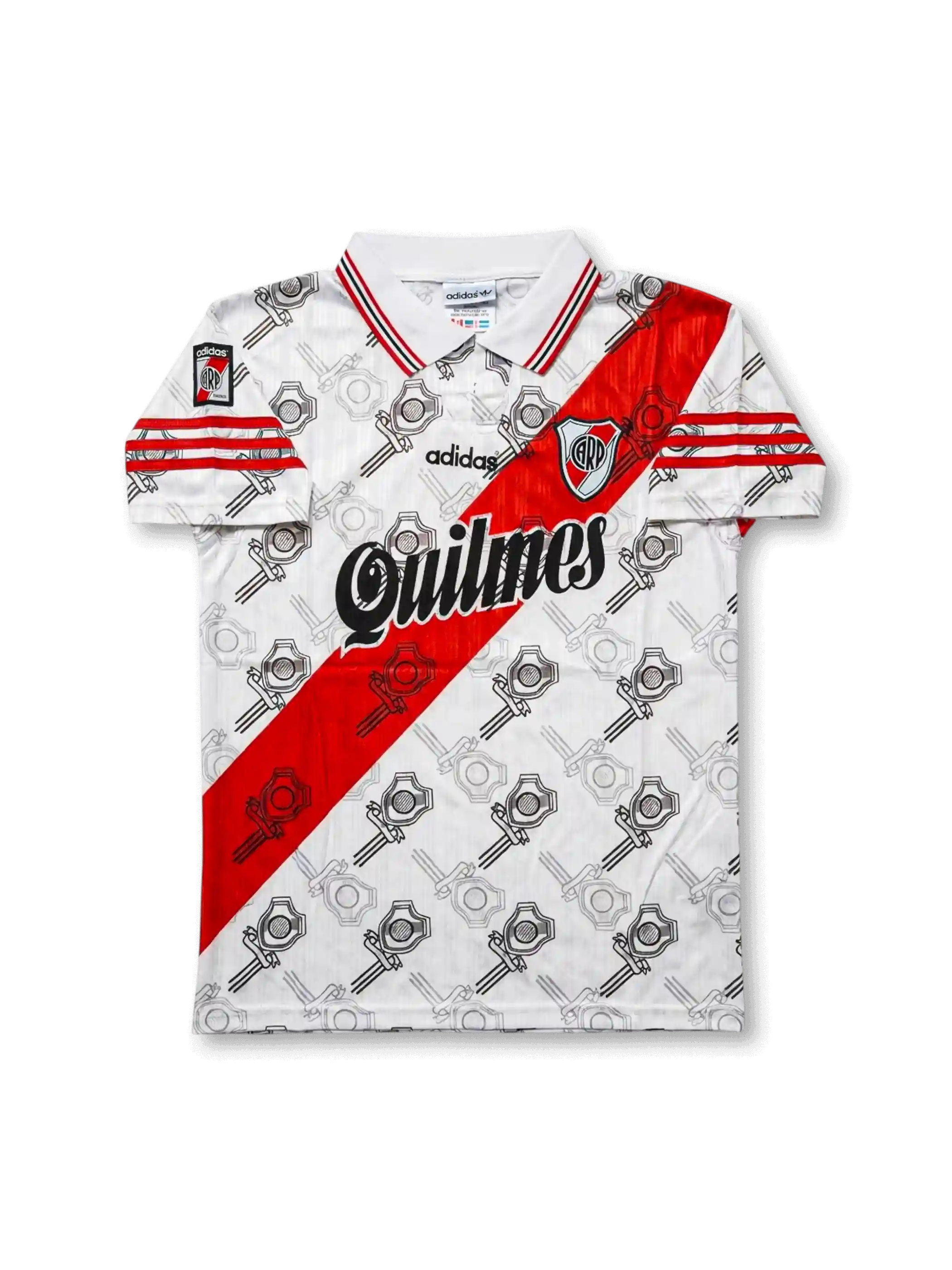 Front view of River Plate 1996–97 home shirt in white with red diagonal sash, Quilmes sponsor, adidas logo, club crest, and all-over graphic pattern.