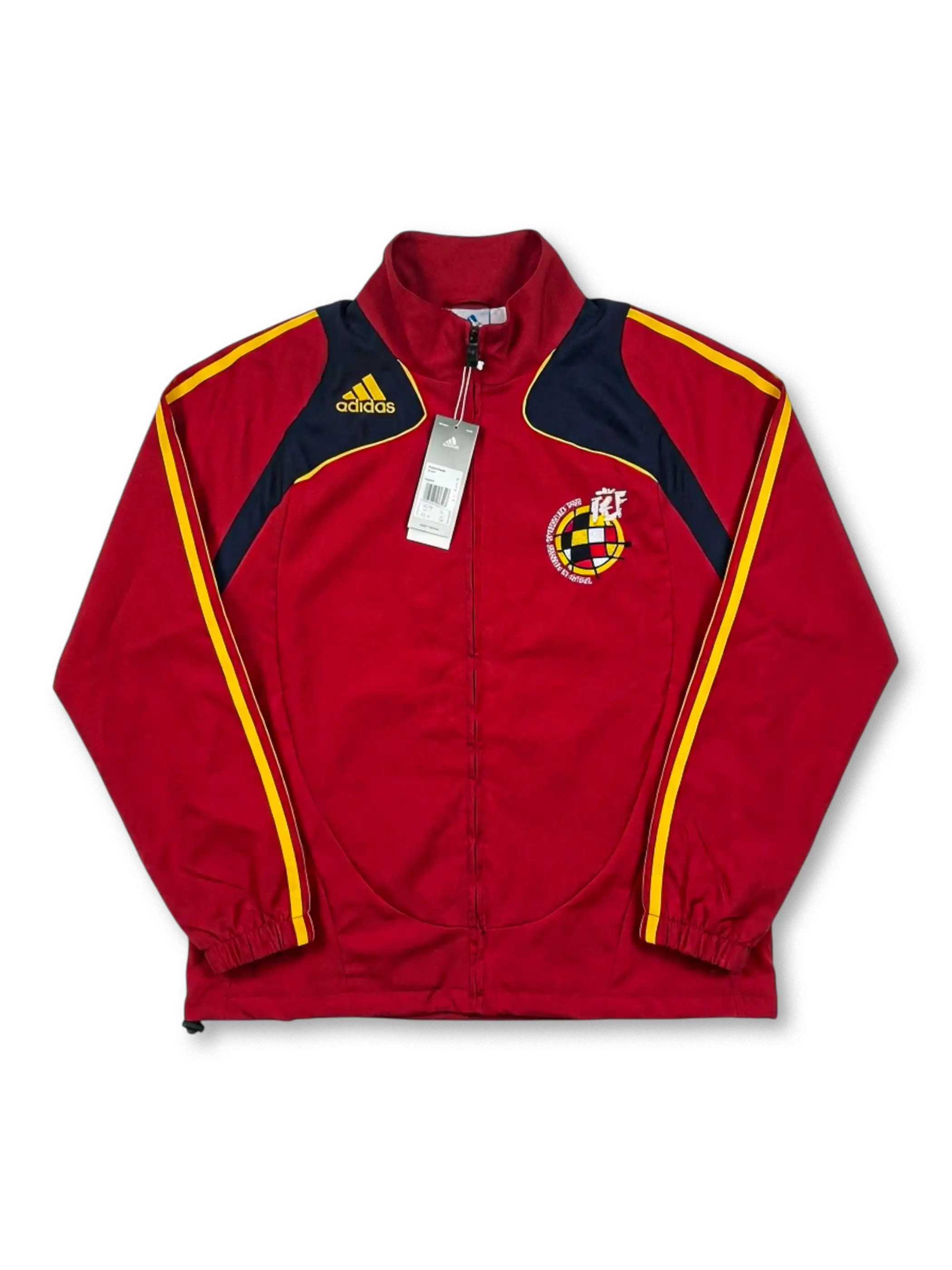 Deadstock Spain national team adidas track jacket in red with curved navy and yellow shoulder panels, yellow Three Stripes, yellow adidas logo at left chest, RFEF centenary crest badge at right chest, original retail tags attached