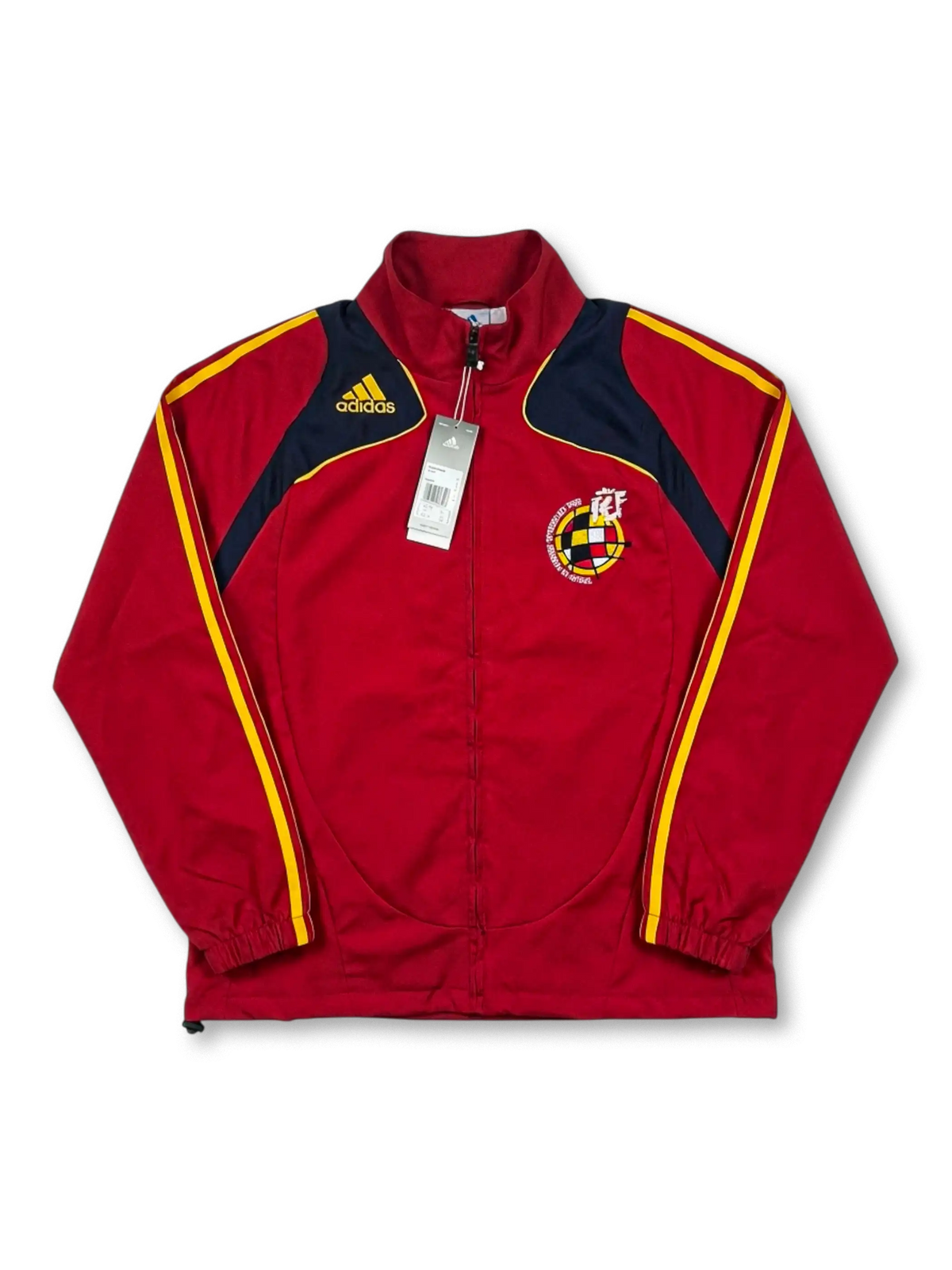 Deadstock Spain national team adidas track jacket in red with curved navy and yellow shoulder panels, yellow Three Stripes, yellow adidas logo at left chest, RFEF centenary crest badge at right chest, original retail tags attached